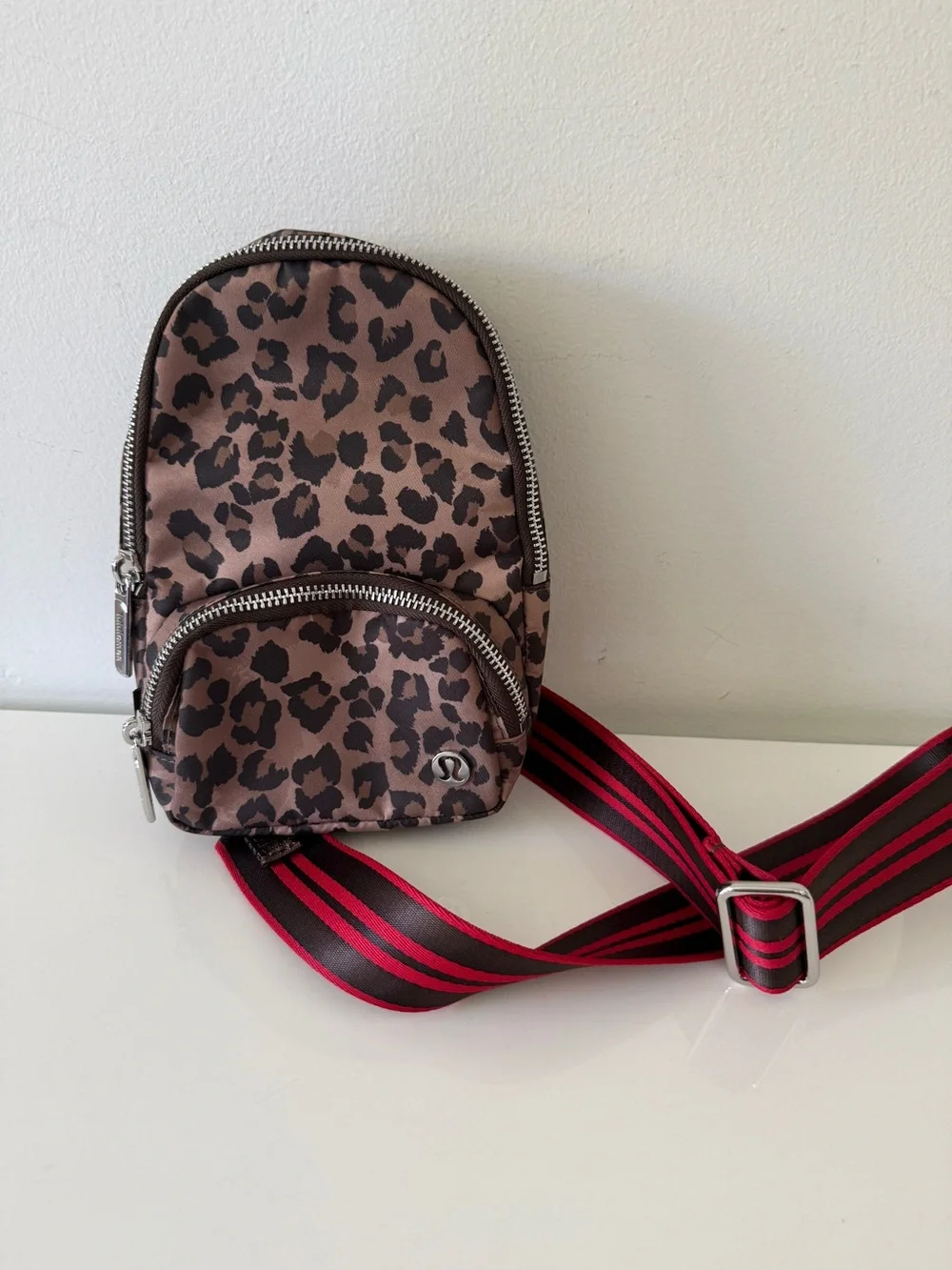 lululemon athletica Leopard Print Crossbody Sling Bag with Red Strap